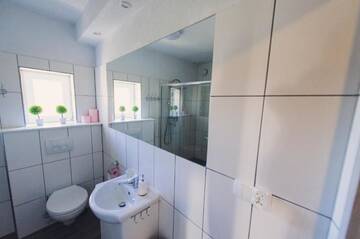 Фото номера Дом с 4 спальнями Дома для отпуска Domek "Na Gwizdówce" г. Załakowo 31